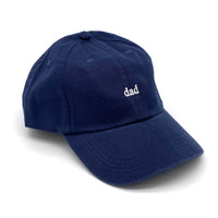 Load image into Gallery viewer, Side profile of Navy cap with the word Dad embroidered in white thread. 
