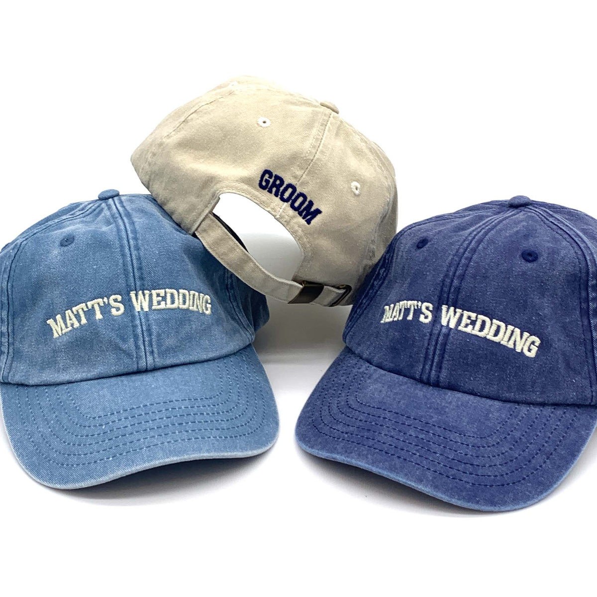 image showing three vintage canvas caps, with Matt's Wedding embroidered on the front and Groom embroidered on the back